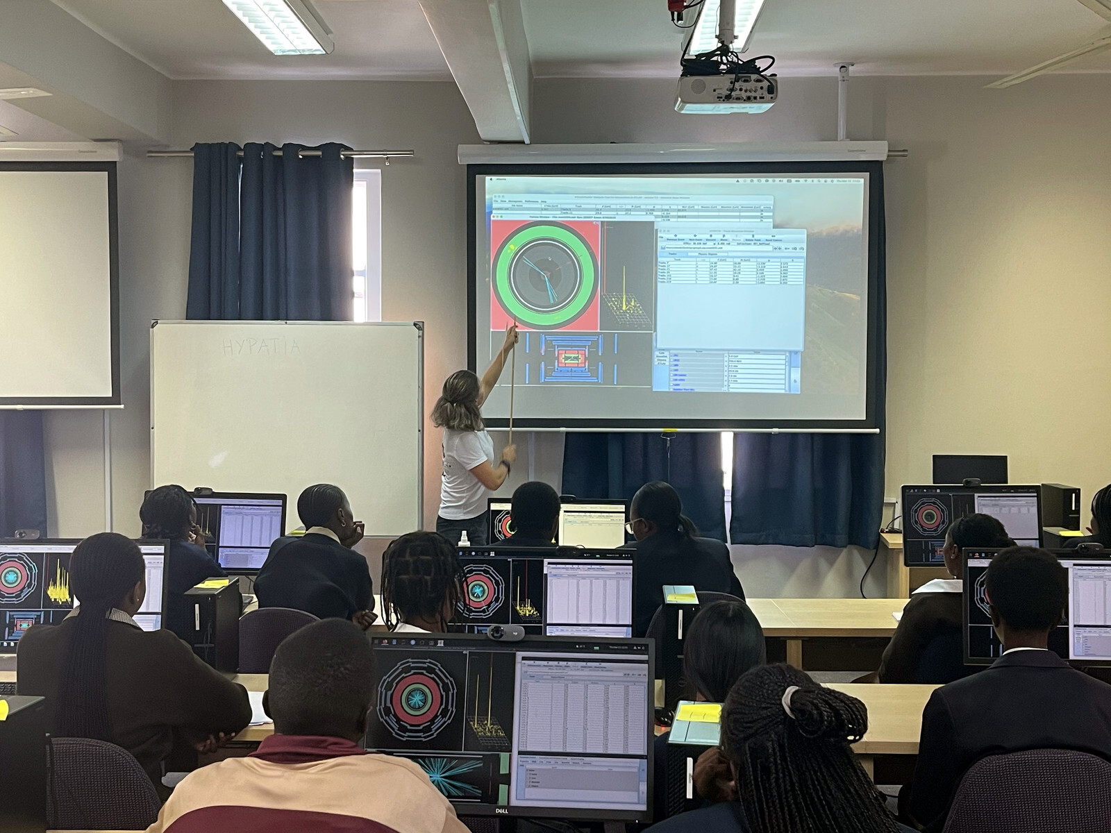 Participants using HYPATIA (Hybrid Pupil’s Analysis Tool for Interactions in ATLAS) during the hands-on session.